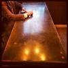 Dining room Concrete table and custom 4x4 base. Inlaid corks. Mattingly Concrete Inc. Indianapolis, Indiana