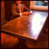Dining room Concrete table and custom 4x4 base. Inlaid corks. Mattingly Concrete Inc. Indianapolis, Indiana